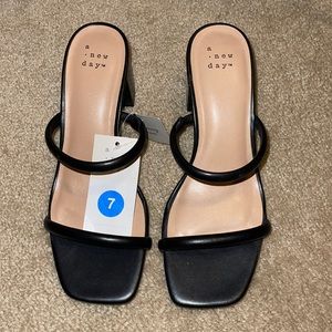 Brand new black low heel sandal